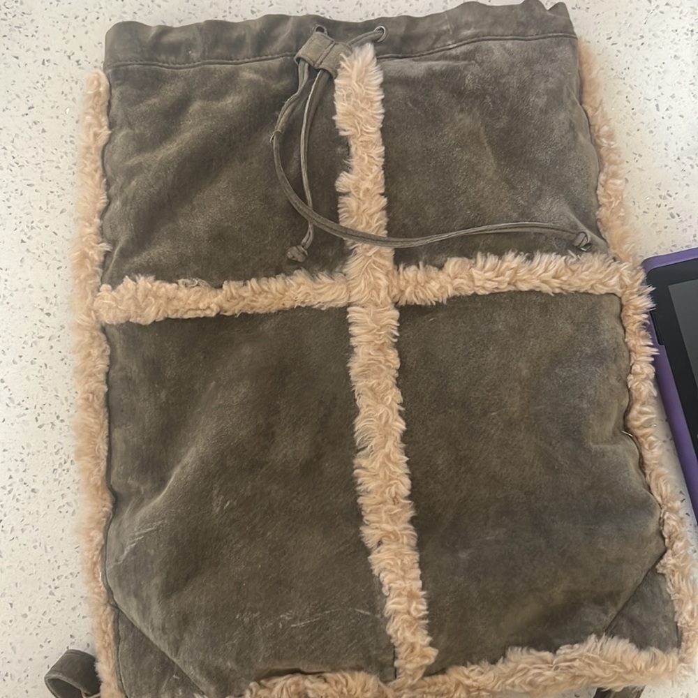 Wilson’s Leather Vintage green shearling backpack